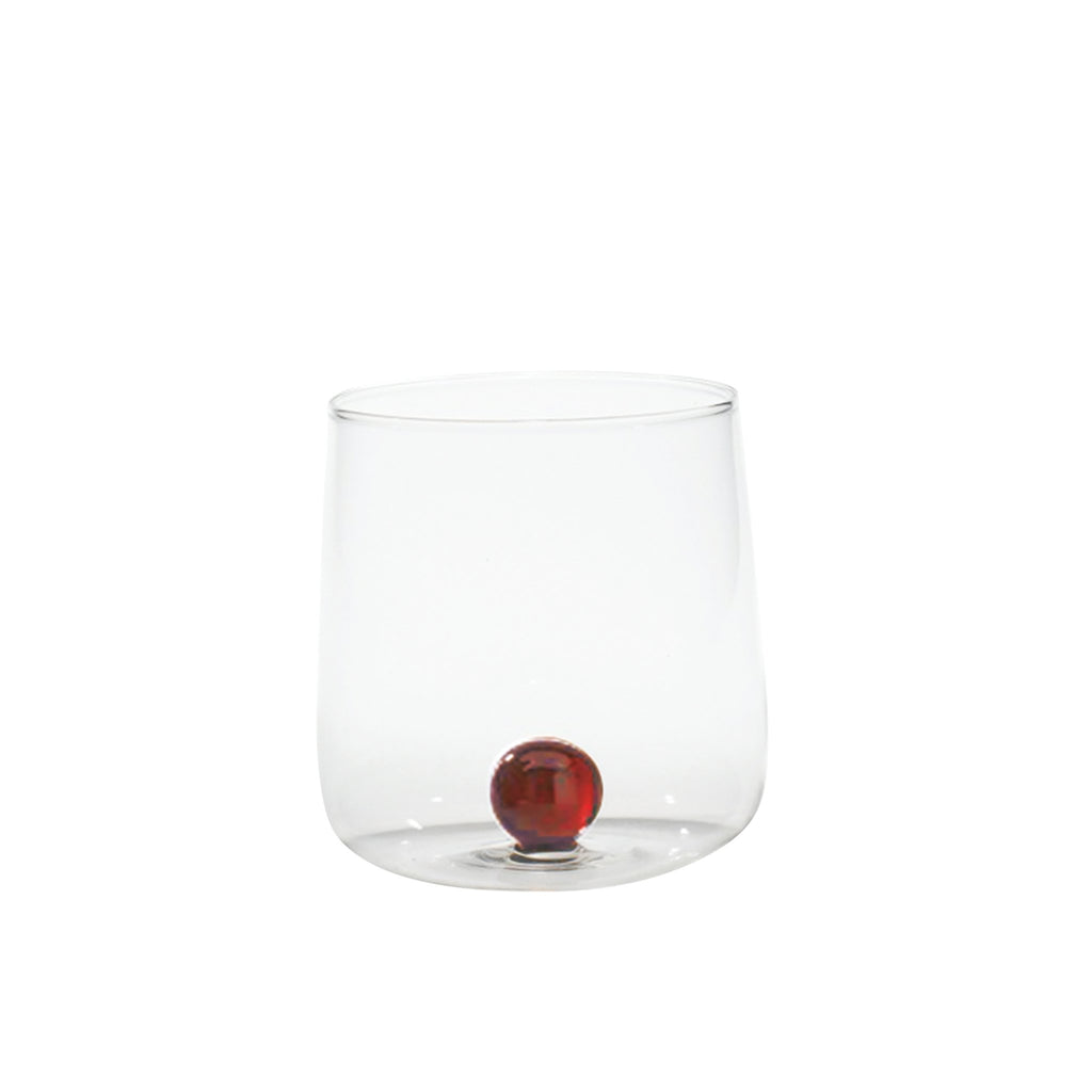 Trinkglas transparent mit amber Murmel im Inneren